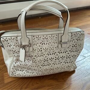 Coach- Chic White Handbag with Cutout Design